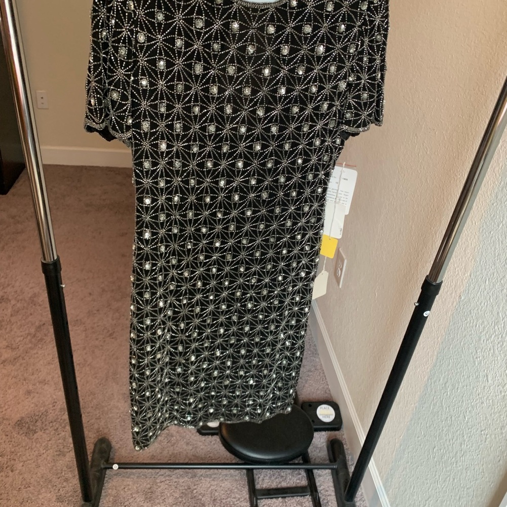 Papell Boutique black cocktail dress with stone accents.